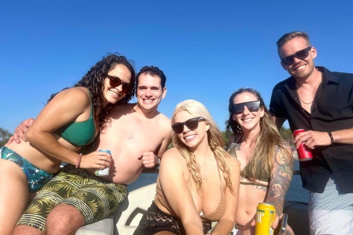 a group of people posing for the camera