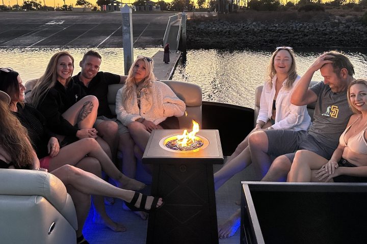 a group of people sitting posing for the camera